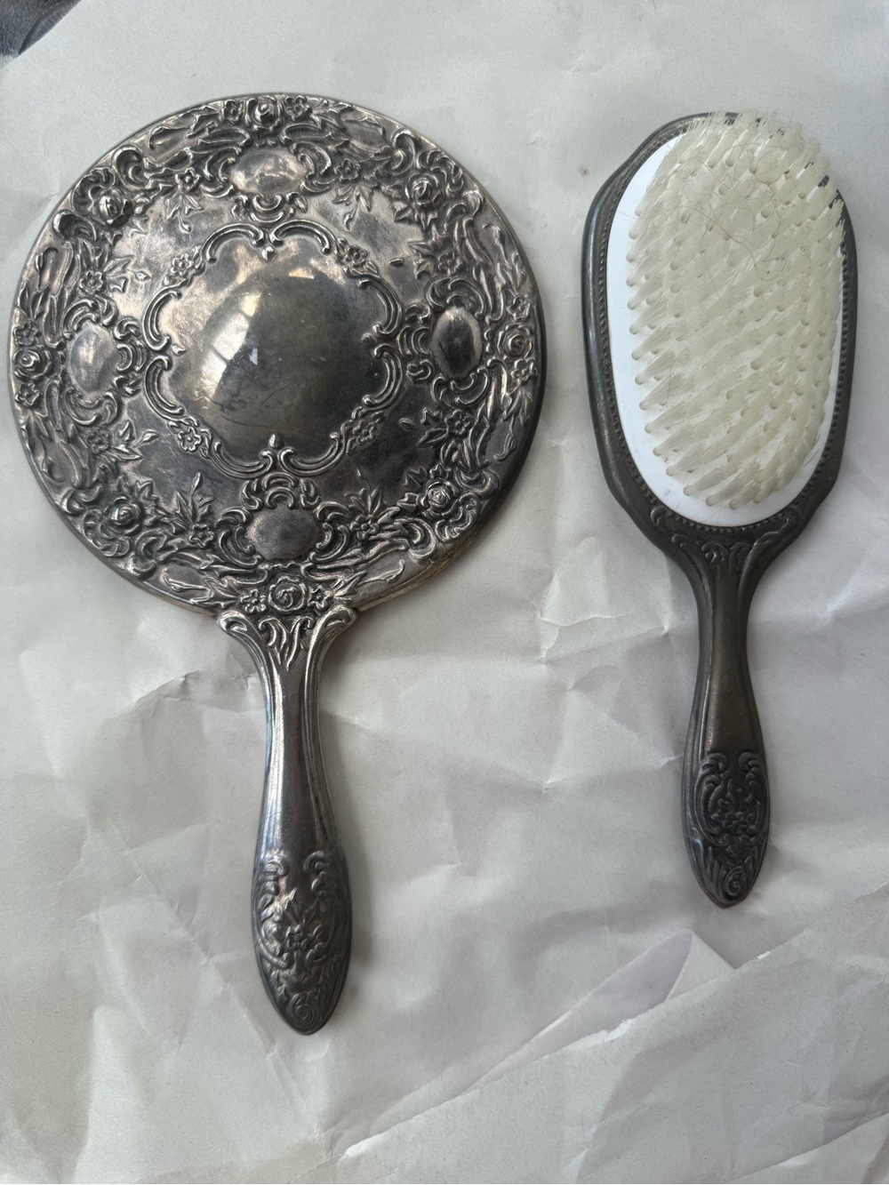 vintage silver-plated hand mirror and matching hairbrush ornate floral